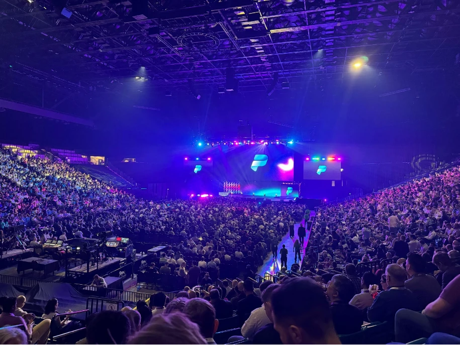 Large audience attends a keynote presentation at the Power Platform Community Conference.